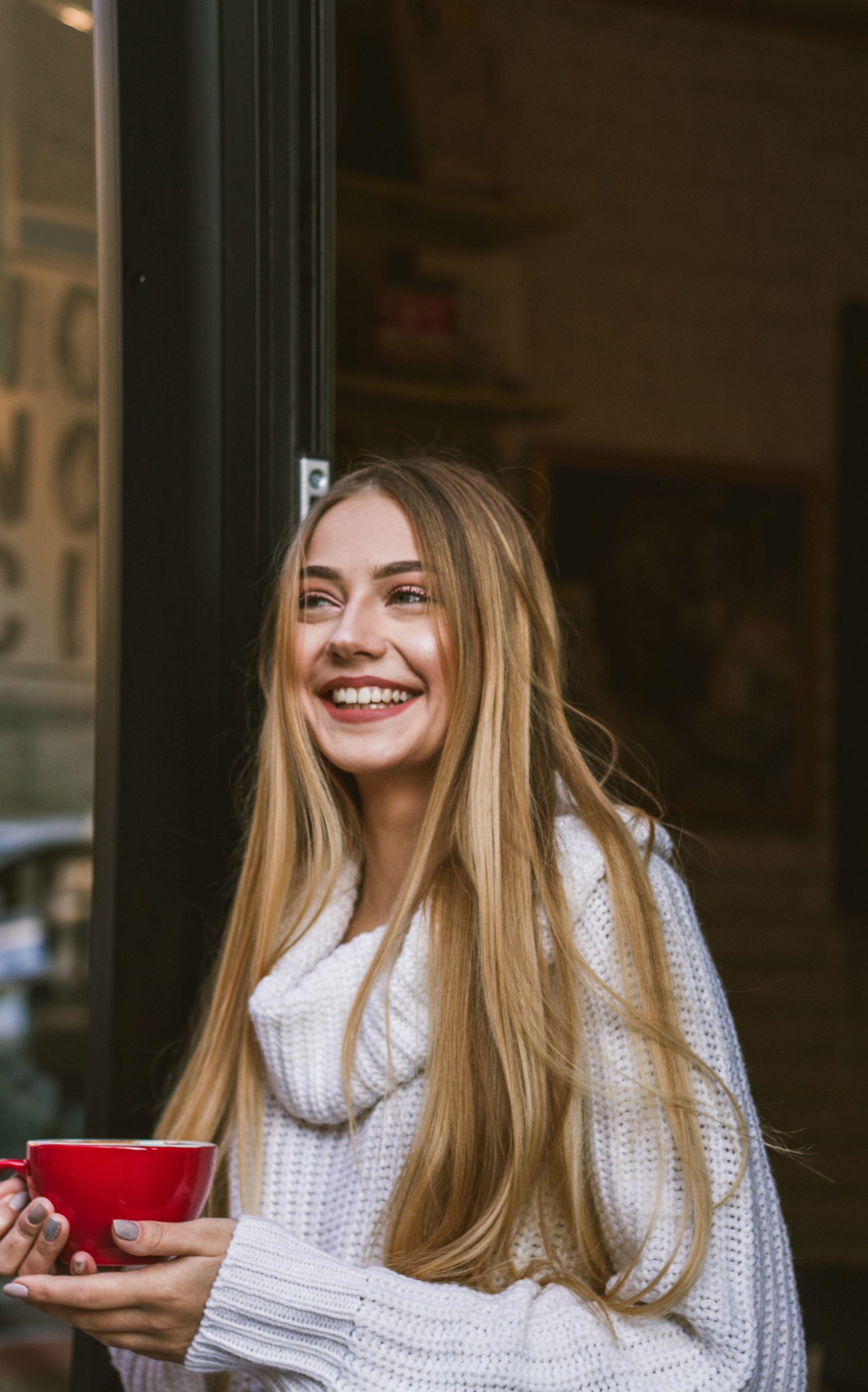 a woman smiling for the camera